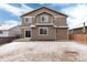 Well maintained exterior with great backyard, patio and sliding glass doors at 12569 S Sopris Creek Dr, Parker, CO 80134