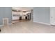 Open concept living and kitchen area featuring modern appliances and hardwood floors at 12569 S Sopris Creek Dr, Parker, CO 80134