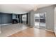 Spacious living room with a fireplace, connecting to the kitchen with modern appliances at 12569 S Sopris Creek Dr, Parker, CO 80134