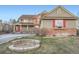 Charming two-story home with a well-maintained lawn and inviting curb appeal at 22911 E Euclid Cir, Aurora, CO 80016
