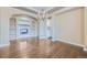 Elegant living room features hardwood floors, a modern fireplace, and arched doorways at 22911 E Euclid Cir, Aurora, CO 80016