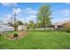Expansive backyard with lush green lawn, perfect for outdoor activities and relaxation at 2792 S Stuart St, Denver, CO 80236