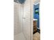 Modern bathroom features a white subway tile shower and a modern vanity at 4647 W Dakota Ave, Denver, CO 80219
