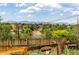 Scenic mountain view from the backyard, with lush trees and charming neighborhood visible at 4647 W Dakota Ave, Denver, CO 80219