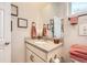 Bathroom with decorative towels, a single sink, and vanity with grey countertops at 21985 E Bailey Pl, Aurora, CO 80016