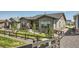 Well-maintained home exterior with a fenced yard, showcasing its attractive landscaping and curb appeal at 21985 E Bailey Pl, Aurora, CO 80016