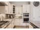 Well-equipped kitchen features stainless steel appliances, ample cabinet space, and sleek countertops for cooking and entertaining at 21985 E Bailey Pl, Aurora, CO 80016