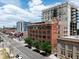 Exterior shot featuring a commercial building, showcasing its brick facade, and surrounding urban landscape at 2000 Arapahoe St # 305, Denver, CO 80205