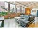 Bright living room boasts an open concept, modern decor, and an abundance of natural light at 2000 Arapahoe St # 305, Denver, CO 80205