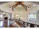 Grand foyer showcasing a staircase, chandelier, and architectural beam ceiling at 1030 S Adams St, Denver, CO 80209