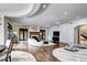 Spacious living room with hardwood floors, a fireplace, and views of the outdoor space at 1030 S Adams St, Denver, CO 80209