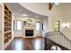 Elegant living room with hardwood floors, fireplace, and built-in shelving at 1030 S Adams St, Denver, CO 80209