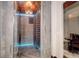 Modern wine cellar featuring climate control, sleek shelving and unique lighting, perfect for wine enthusiasts at 1030 S Adams St, Denver, CO 80209