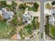Aerial view of the property showcasing the home's layout, mature landscaping, and inviting outdoor spaces at 6391 S Malaya St, Centennial, CO 80016