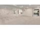 Spacious finished basement offering a large recreational area, ample lighting, and convenient access to the backyard at 6391 S Malaya St, Centennial, CO 80016