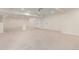 Spacious carpeted basement with recessed lighting and ample room for recreation at 6391 S Malaya St, Centennial, CO 80016