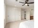 Bedroom features a ceiling fan, large closet, and easy access to the bathroom and hallway for optimal comfort and convenience at 6391 S Malaya St, Centennial, CO 80016
