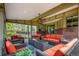 Inviting covered patio offers ample seating, a ceiling fan, and is perfect for outdoor gatherings and relaxation at 6391 S Malaya St, Centennial, CO 80016