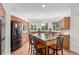 A lovely kitchen with granite countertops, wood cabinets and stainless steel appliances at 6391 S Malaya St, Centennial, CO 80016