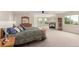 Spacious main bedroom suite with fireplace, large windows, and plenty of natural light at 6391 S Malaya St, Centennial, CO 80016