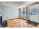 Bright living room featuring hardwood floors and lots of natural light at 17936 Becket Dr, Parker, CO 80134