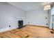 A cozy living area with hardwood floors and a fireplace at 17936 Becket Dr, Parker, CO 80134