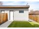 Low maintenance backyard featuring artificial turf and a modern exterior with a minimalist design at 2231 W 36Th Ave, Denver, CO 80211