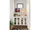 Charming coffee bar nook with custom cabinetry, stylish decor, and ample storage for coffee essentials at 2231 W 36Th Ave, Denver, CO 80211