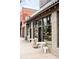 Attractive coffee shop with outdoor seating, large storefront windows, and a welcoming brick facade at 2231 W 36Th Ave, Denver, CO 80211