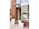 Restaurant entrance of DUO, adorned with potted plants and white planters at 2231 W 36Th Ave, Denver, CO 80211