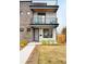Charming modern home with a private balcony, stone accents, and meticulous front yard at 2231 W 36Th Ave, Denver, CO 80211
