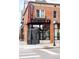 Kumoya Japanese Kitchen exterior with neon sign and brick facade at 2231 W 36Th Ave, Denver, CO 80211