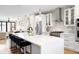 Modern kitchen featuring a spacious island, stainless steel appliances, and contemporary finishes at 2231 W 36Th Ave, Denver, CO 80211