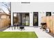 Cozy patio with outdoor seating, a fire pit, and a grill, perfect for entertaining guests at 2231 W 36Th Ave, Denver, CO 80211