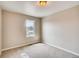 New carpet in bedroom with window and white painted walls and baseboards at 13374 Blue Amber Ct, Parker, CO 80134
