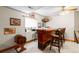 Basement bar area with wood bar top and three bar stools at 7900 E Dartmouth Ave # 76, Denver, CO 80231