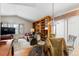 Bright dining area features built-in shelving and access to the living room at 7900 E Dartmouth Ave # 76, Denver, CO 80231