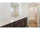 Modern bathroom with vanity, quartz countertop and bathtub at 996 Kolz Pt, Elizabeth, CO 80107