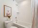 Clean bathroom with a white bathtub, toilet, and shower at 996 Kolz Pt, Elizabeth, CO 80107
