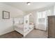 Cozy bedroom with a unique house-frame bed and neutral carpet at 996 Kolz Pt, Elizabeth, CO 80107