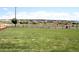 Community park offers a playground, walking path, and green space for Gathering enjoyment at 996 Kolz Pt, Elizabeth, CO 80107