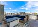 Relaxing deck area with modern seating and fire pit at 1043 High Point Trl, Elizabeth, CO 80107