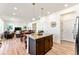 Spacious kitchen with an island, bar seating and an open floor plan at 1043 High Point Trl, Elizabeth, CO 80107