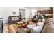 Inviting living room with stylish decor, comfortable seating arrangements, and an open layout at 1043 High Point Trl, Elizabeth, CO 80107