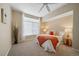 Spacious bedroom with neutral decor and ceiling fan at 9468 E Florida Ave # 1047, Denver, CO 80247