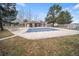 Community pool with covered area and surrounding landscaping at 9468 E Florida Ave # 1047, Denver, CO 80247