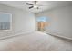 Spacious bedroom with natural light and sliding glass door to the yard at 2184 Alyssa St, Fort Lupton, CO 80621