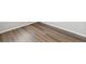 Detailed view of modern wood-look flooring, seamlessly installed at 2184 Alyssa St, Fort Lupton, CO 80621
