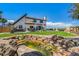 Luxury home with a spacious backyard, water feature, and patio at 6238 W 80Th Pl, Arvada, CO 80003