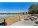 Lakefront backyard with fire pit and seating area at 6238 W 80Th Pl, Arvada, CO 80003